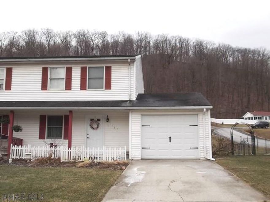 Corner property with fenced in yard. 1 car garage. 3 bedrooms, 1.5 baths. Hardwood and laminate floors. Good condition. Toward back of devopement.