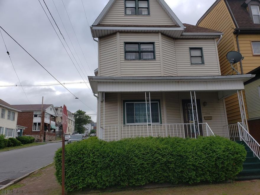 If you are looking for a house to update and make your home, look no further. This 3 bedroom 1.5 bath home sits on a corner lot with off street parking. The home features an updated kitchen, living room, family room, formal dining room and half bath on the first floor. There is a sunporch leading into the kitchen of you are looking for additional entertaining space. The bedrooms and bathroom on the second floor are large and have endless possibilities.  Call listing agent for more information or your private showing.