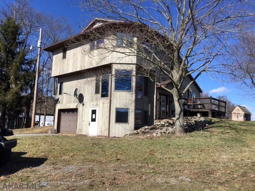 Contemporary home on 2 acres in scenic Wells Valley, Forbes Road School District. Three bedrooms, 2 full baths. Beautiful mountain views. Needs some TLC.