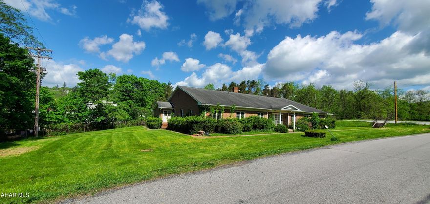 11+/- ACRES HOLLIDAYSBURG just off Rt. 22 near the Borough!  Included is a HUGE 7,000 + sqft brick office building on ENDLESS POSSIBILITIES!!  CONSTRUCT STORAGE UNITS, SMALL PRIVATE SCHOOL, CHURCH, DAY CARE, MEDICAL OFFICE, HOME NURSING, list goes on!  Currently Zoned Manufacturing, but customer can apply for zoning variance 'change of use' application and brought up to codes with Frankstown Twn.  GREAT OPPORTUNITY!!