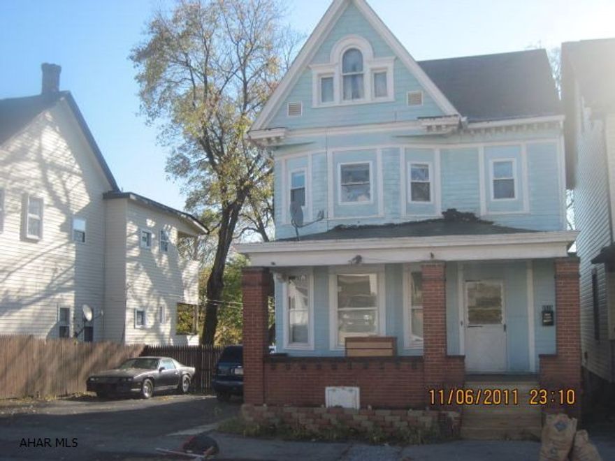 Great home in great neighborhood! 4 Bedrooms, 1 Bath, 1/2 Bath in basement. Nice spacious rooms, hardwood under all carpet. Completely fenced double lot with off-street parking and 2 car detached garage. Nice covered deck with porch swing. Tons of character, efficient hot water heat, good mechanics. Laundry in basement and hook-ups on 1st floor! Eligable for $134.00 tax homestead credit!