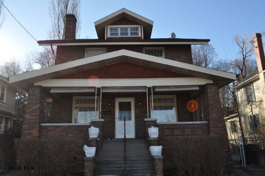 THIS 2.5 STORY 4/5 BEDROOM HOME COMPLEMENTED BY A LARGE 1ST FLOOR MASTER WITH BATH. FEATURES A LARGE LIVING ROOM WITH FIREPLACE( HARDWOOD FLOORS UNDER THE CARPET) ,DINNING ROOM, KITCHEN WITH ISLAND, FIRST FLOOR LAUNDRY,FENCED IN LOT WITH OFF STREET PARKING.