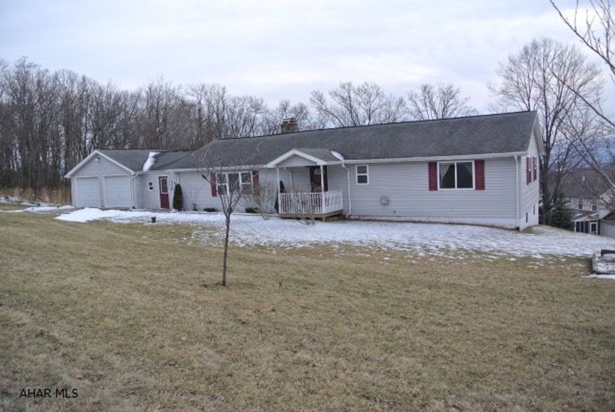 What a nice home!   This large modern One story home has a some great extras...like the oversized 2 car attached garage, a swimming pool with deck,, a fully finished walk-out basement, and a lot that nearly equals a full acre of ground.This home also has a modern oak kitchen, sliding doors to a rear deck viewing chapel hill estates, nice side bedrooms, hardwood floors, main floor laundry hook ups, and central a/c.   This is a very spacious home.We are in process of getting quotes to change driveway direction.