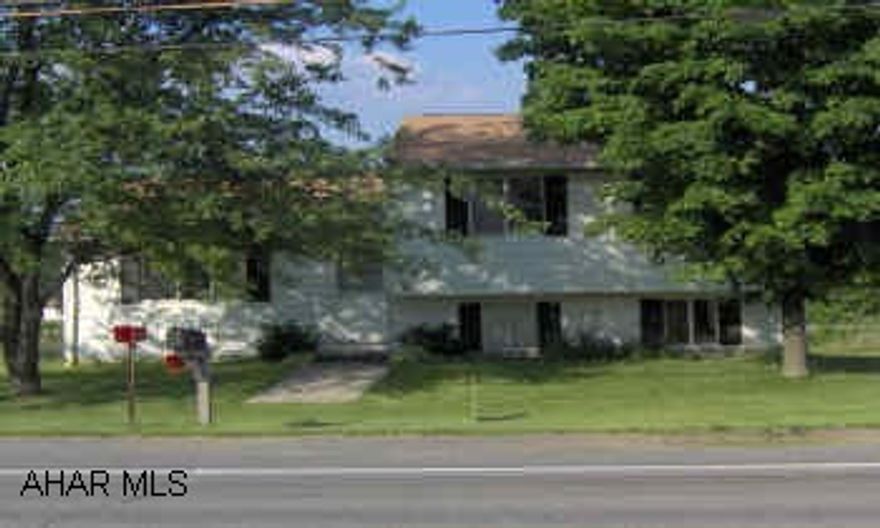 From Bedford, Rt 30W.  House is on the right, near Lakewood Manor.  Sign in yard. Well maintained raised ranch.  Would make a great starter home!
