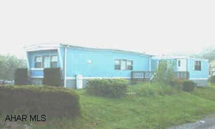 Well cared for Mobile Home on large lot w/foundation.  Off street parking.  seller will look at all offers.