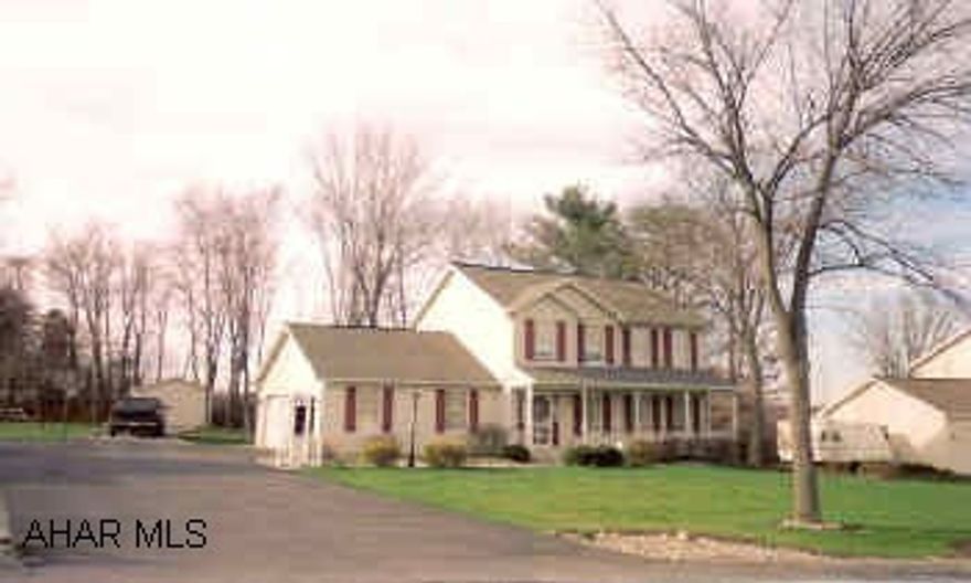 Immaculate two-story home full of charm. Sunroom with gas fireplace, formal dining area, finished family room in basement, hardwood floors. Rear covered deck, basketball hoop.