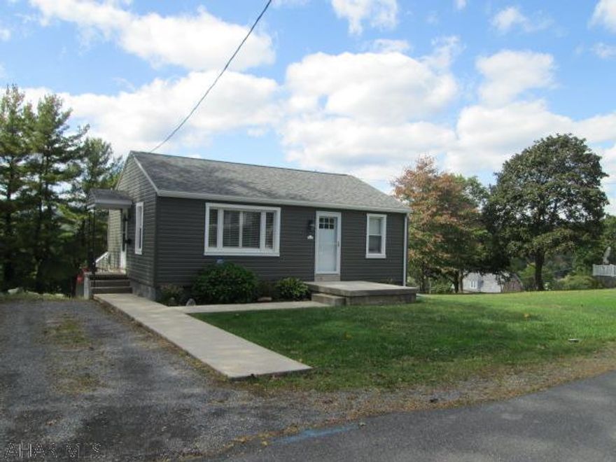 Cute one story midway between Hollidaysburg and Altoona. This updated 2 BR features eat in kitchen w/granite tops & tile floors. The updated bath features glass shower stall and tile floors. This home has hardwood and tile floors throughout. The full basement has a laundry area, work shop and leads out to a private screened sunroom.