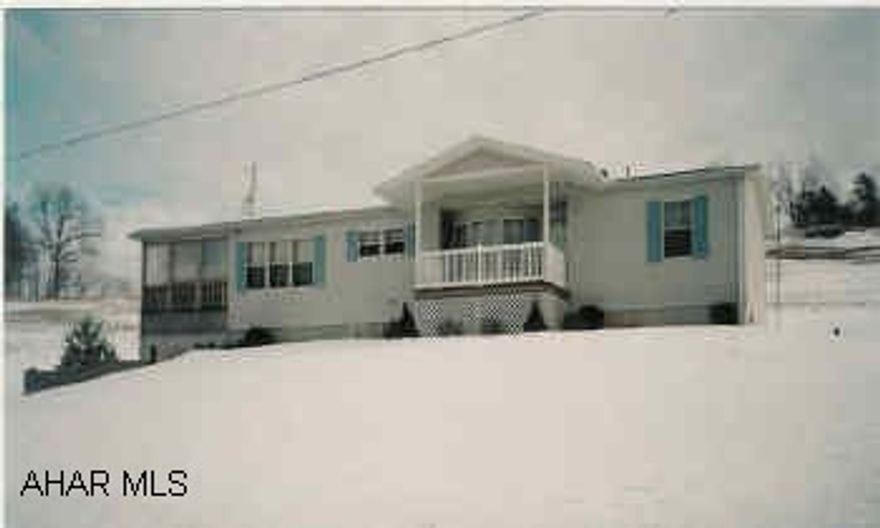 Ranch home in country with 3BR/2BA, master suite w/jacuzzi tub, skylights and great view of the mountains. Double-wide with basement.