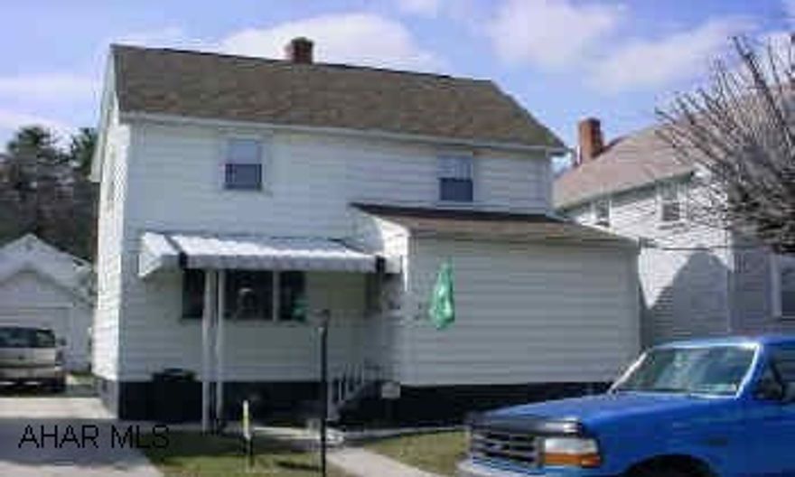 Toytown Area home with central air and third bedroom in the basement.