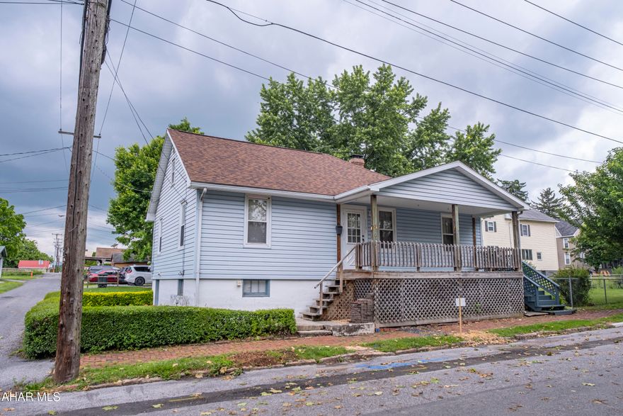 Cute one story home in Borough of Hollidaysburg . Great starter home or investment property. Newer roof, large built in closet in master bedroom. Recently connected to the new borough sewer. Outside enjoy the large side deck and porch or relax in the park like setting in the additional lot included next door. Don't let this one get away!

House being sold AS IS. Seller will not make any repairs.