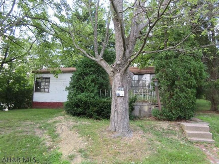 Calvert Hills home in disrepair. Some potential, but possibly should be torn down. Great neighborhood - would make a great building lot.