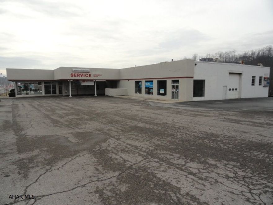 Former auto dealership could be used for many purposes. Mulitple levels above ground can permit many uses. High traffic road offers great visibility. Building has been well maintained.