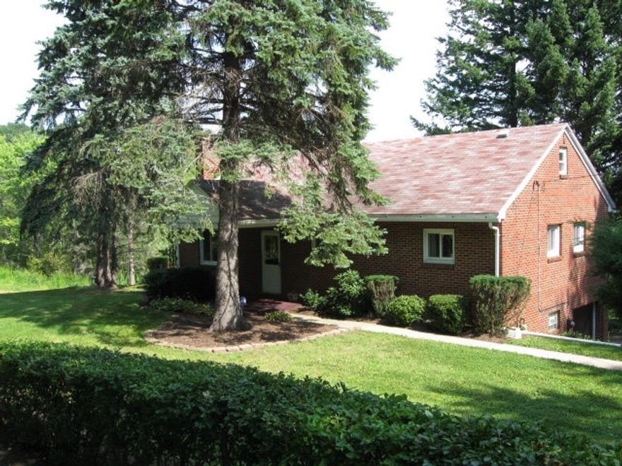 WEST FALL PARK AREA - LOGAN TOWNSHIP - Ebner School! A PERFECT PLACE FOR PEACE AND QUIET in this SOLID 3 bed brick ranch with hardwood floors, new windows and furnace. Fireplace and deck on .44 PRIVATE acre just past city line for $132,900! NOTE: Can also buy adjoining properties (see survey) separate or combined. An additional 3 ac in Logan Twp for $50,000 and 2 city lots adjoin and are located in City of Altoona for $12,000 pair and are 40 x 120 each and known as 2200 and 2202 17th Ave. 3 Ac lot is buildable and can hook up to city sewer with access via 21st Ave. with sale price of $50,000.  The two city lots can be used as additional access or build. Entering driveway and viewing of property by appointment only.