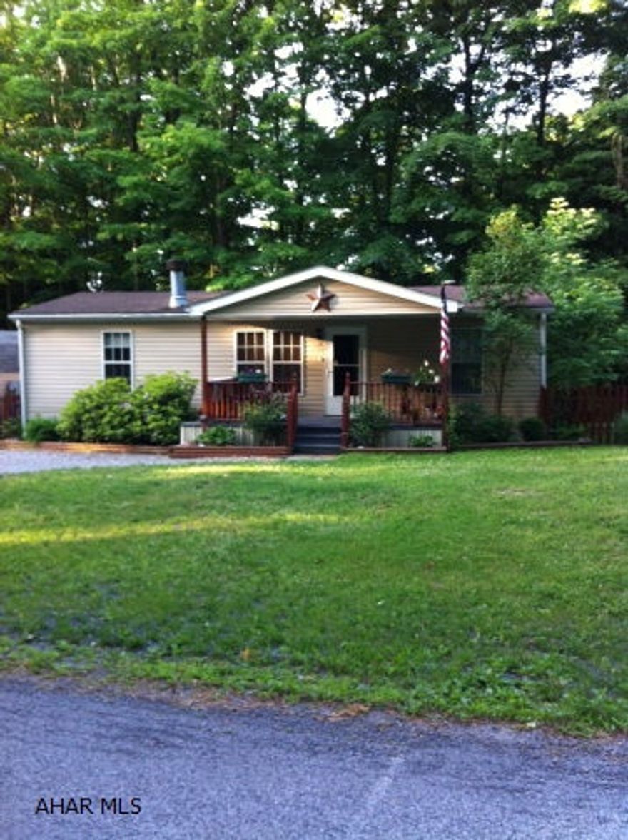 Very nice double wide on corner lot in Glendale Yearound. Well maintained and in good condition. Large Florida room addition. Priced to sell.