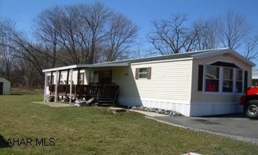 2 Bedroom, Full Bath, With A Step Up Semi Formal Dining Area. Nicelly Cared For Single Wide M.H., With Newer Roof, C/A, And Side Porch, Step Up Into Your Semi Formal Dining Area, With It's Own Cabinetry - Nice Open Kitchen, L.R., 2 Bedrooms, Full Bath W / Garden Tub, And Free Standing Shower.