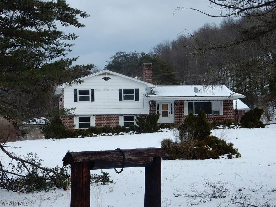 Make this your home with your personal updates and ideas.  This is a multi-level home with a lot of space.  Beautiful setting on 2.28 acres with creek on the property, outdoor fireplace and 3 car brick garage.