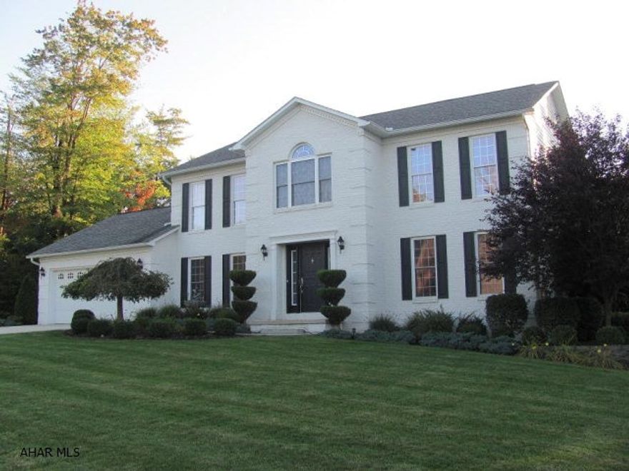 Beautifully Maintained home in Timber Ridge Estates. Level landscaped private yard with covered patio. 3 Large  bedrooms w/possible 4th. Fireplace in FR. Tiled laundry room on second floor. Newer Washer and Dryer included. Custom bar and game area in finished basement. Attached 2 car heated garage and separate side concrete area for additional parking. Custom built work shed in backyard. Move in ready.