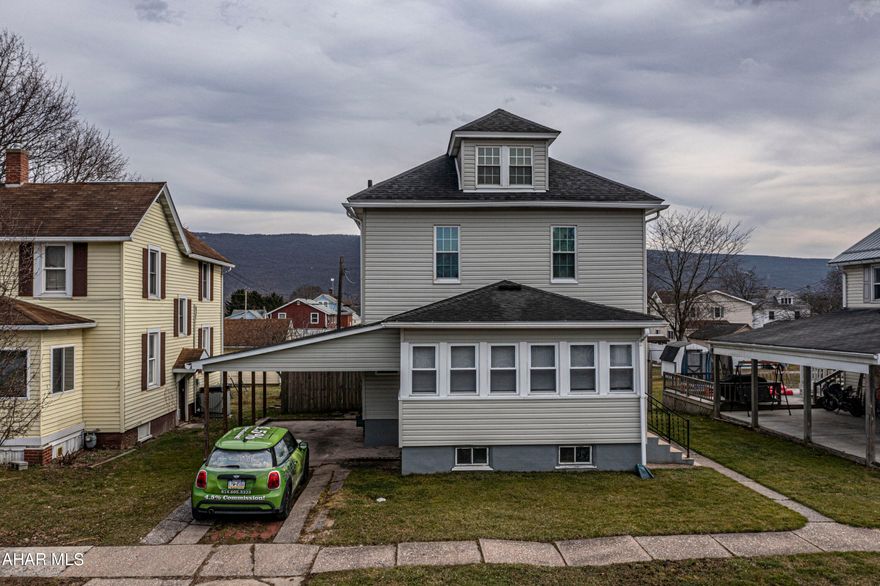 Cozy 3 Bedroom, 1 Bath located in Bellwood Boro. Features include: tall ceilings, sunroom, spacious kitchen, fenced in yard, 1 car detached garage, carport, and off street parking.  The finished attic could be used as a 4th bedroom or office. With newer windows, hot water tank, high-efficiency boiler, and siding this home is truly move in ready!  **OPEN HOUSE FOR 3/12/23 IS CANCELED!