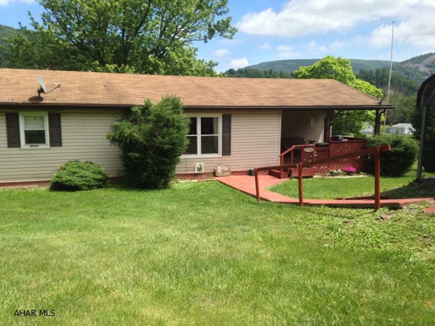 This home has a large kitchen and living room, and is located on a No Outlet road, providing plenty of privacy. The property comes with several sheds for outdoor storage and a view of the mountains. There is plenty of parking and it is only a short distance from the elementary school.