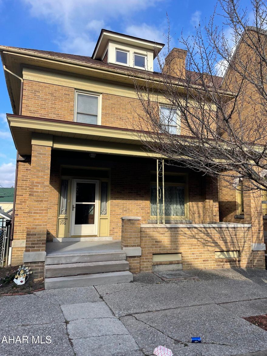 Beauty and charm!! This solid brick home has so much potential with fenced yard and 1 car garage. As you enter the home you will find a large foyer, the living room and dining room have beautiful hardwood floors and pocket doors, large kitchen with plenty of built-in cabinets. Double staircase to 2nd floor has 4 bedrooms, full bath and the large walk up attic is heated with endless possibilities.