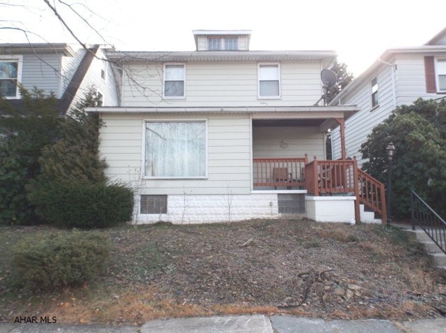 New sewer line in 2015.  New hot water tank and furnace in 2012, 100 amp circuit breakers. Brick fireplace and wood floors in living room.  New tile flooring in kitchen and bath.  New countertops in kitchen.  Stairs to unfinished attic.  Spacious home in nice neighborhood.