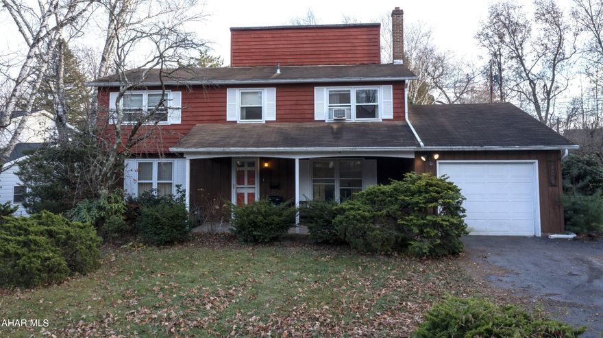 Two story home situated in State College Borough with so much potential.  The main floor has an eat-in kitchen, formal dining room, and living room.  The second floor has four bedrooms that feature hardwood flooring.  Master bedroom has an en-suite bath with walk-in shower.  There is a second full bath on the second floor as well.  The home has a greenhouse off the rear of the home and an attached 1 car garage. Red plot lines on aerial photo are approx plot lines and are just for reference.