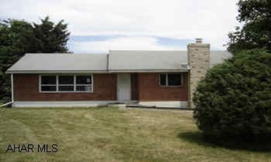 3 Bedroom brick ranch home on approx 1/2 acre.  Hardwood floors and large living room.  Partial finished basement with stone fireplace.