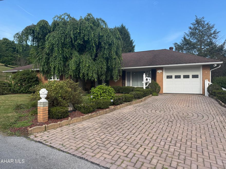 Beautiful brick rancher on a nice corner lot. This home, being sold to settle estate, features 3 bedrooms, ceramic bath, large living room, formal dining room and eat in kitchen. Full basement ready for finish.  Front and back porches. Attractive home ready for you!!