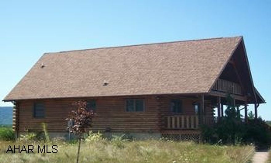 Beautiful log 1.5 story near Trough Creek State Park.  Great country living or vacation getaway!  Property has freeze damage. Property is being sold in AS IS condition. Required wording for sales agreement:  "Pursuant to paragraph 28 of the real estate purchase addendum, this document is subject to all terms and conditions set forth in the real estate purchase addendum." Purchase this property for as little as 3% down! This property is approved for:  HomePath Renovation Mortgage. Please contact listing agent for more information. Property is located in Cassville.