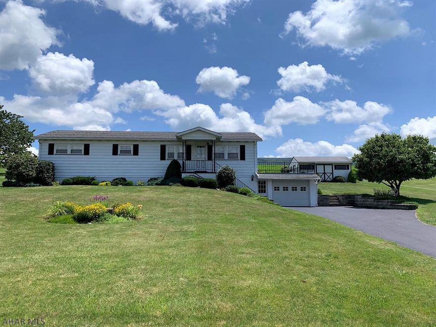 This very well maintained  and well cared for ranch home offers three bedrooms, a full bath, large living room and a dining area. Front covered porch, side concrete deck and large rear sun porch. Full basement that is partially finished, one-car garage, 200-amp electric, electric BB heat and an oil stove. Updated roof and replacement windows. Paved driveway, nicely landscaped site, storage shed and great views.  This one is move in ready!!