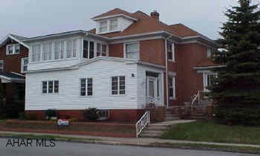 Leaded glass windows - great level lot- fenced yard- window seats- carbon monoxide detector- pocket doors. Cool House!!  Spacious rooms, 12 ft ceilings, new roof, new furnace, totally rewired, brick repointed, vinyl siding porch, low taxes, 4 air conditioning units.  A must see in Columbia Park!!