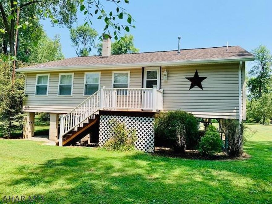 Immaculate! Move-in Ready adoreable, spacious cottage/bungalow with everything you need!  Lovely cherry kitchen, enclosed wrap-around porch for relaxing and enjoying the peacefull surroundings. Large pavillion with firepit for entertaining.  Swing set for the children and large storage shed. Kayaking, fishing and swimmming near by. Completly furnished!