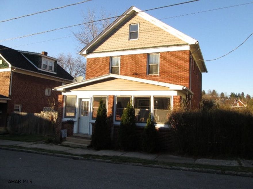 This is the perfect home for the first time buyer!  Large living room and formal dining room.  Lovely kitchen with new cabinets.  Large bedrooms with plenty of closet space.  Beautiful finished attic.  New roof in 2012. Priced right and ready for a new owner!