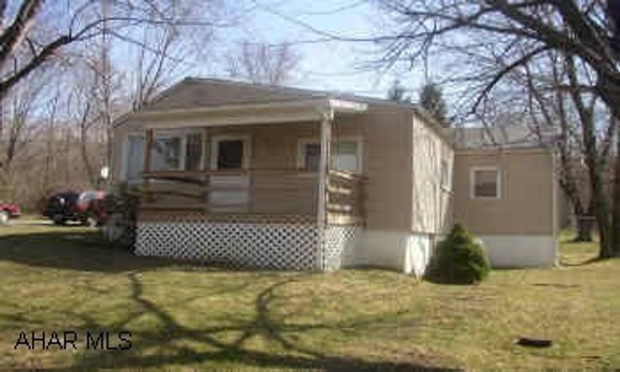 VERY NICE 2 BEDROOM RANCHER ON QUIET SIDE STREET, DOUBLE SIZED LOT, HARDWOOD FLOORS, SCREENED IN PORCH, ABOVE GROUND POOL, CENTRAL AIR.  PRICE REDUCED!  OWNER WELCOMES OFFERS.