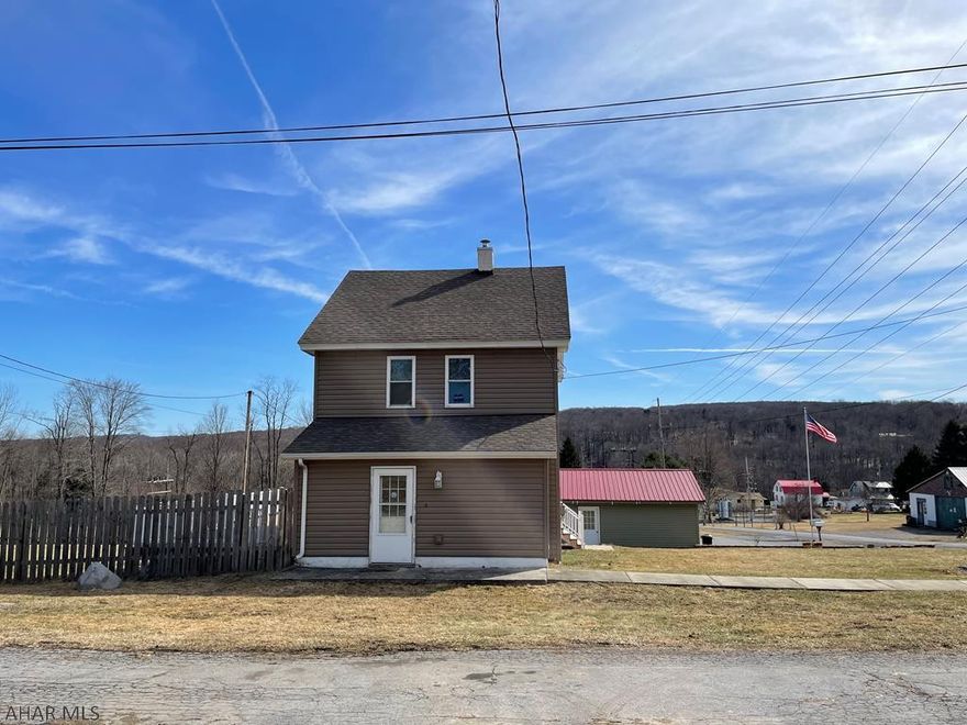 This home has had many updates throughout and current owners have kept the original woodwork.  Also features a newer kitchen with plenty of cabinets and granite countertops, great for meal prep.  Newer flooring throughout the home.  New garage.  Large wrap around deck for entertaining, and a large fenced yard.  Call today.