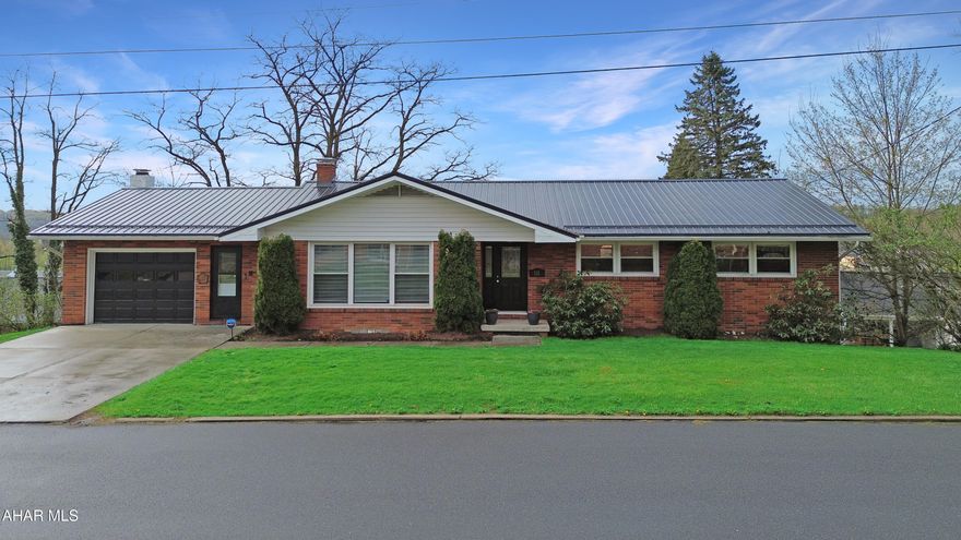 Welcome to 111 Clara Street, located in the heart of Ebensburg Borough! This beautifully maintained all-brick ranch offers a perfect blend of quality construction, thoughtful updates, and functional living space. Step inside to a welcoming foyer that opens into a bright and spacious living room filled with natural light. The main level also features a formal dining room and an updated kitchen complete with included appliances. A convenient mudroom/laundry area adds everyday practicality. You'll find two generously sized bedrooms, a fully updated guest bathroom, and a private primary suite featuring its own full bathroom. The fully finished walkout basement expands your living space with a large family room highlighted by a cozy gas fireplace, a fourth bedroom, an additional full bathroom, and a versatile bonus living area - perfect for entertaining, guests, or a home office. There is also ample storage throughout. Outside, enjoy a one-car attached heated garage, off-street parking, and a fenced-in rear yard. The stamped concrete patio provides a great space to relax or entertain. Recent updates include a durable metal roof, updated electrical system, newer furnace, and more. Don't miss your opportunity to own this move-in ready home in a desirable location. Schedule your showing today!