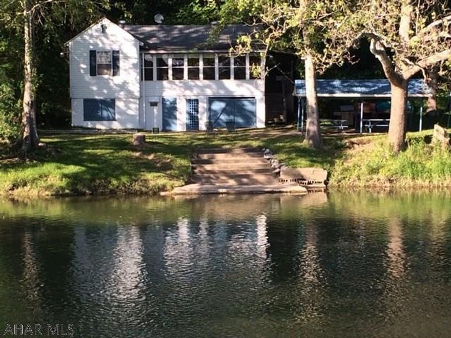 Unplug and relax at your new riverside retreat! Sit on the sun porch and feel the stress of the week just melt away. This fully furnished home is situated on almost 200 ft of river frontage and can sleep 9! A 10 x 20 pavilion, horse shoe pit and fire ring are already set up and waiting to be enjoyed. Or, spend the day fishing on your own property or launch your canoe or kayak down the Juniata River off of your private dock. Conveniently located just 5 minutes from Bedford and 10 minutes from Everett. Total sq ft is estimated.