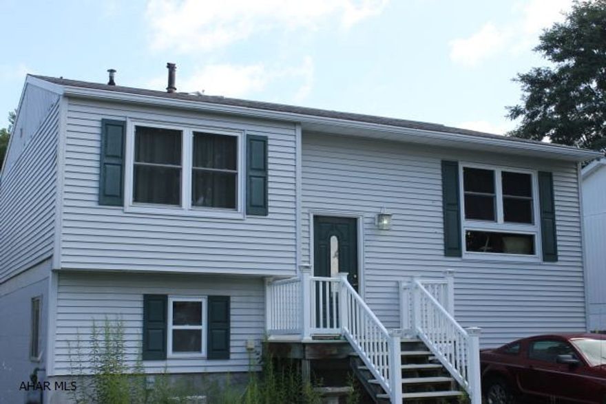 3 possible 4 bedroom Bi-level home in Bellwood School District. EIK with oak cabinets with open view to living room. Lower level includes large family room with walk-out to back yard that offers deck and above ground pool.