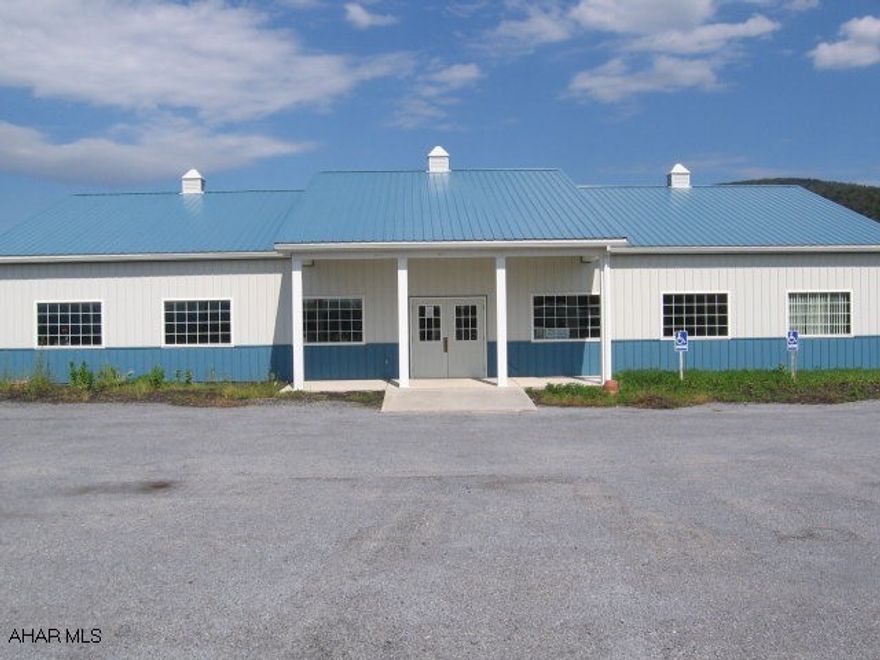 Over 12 acres located on busy Rte 164 just west of Martinsburg beside Longs Outpost. Large part of acreage is flat with a tar & chipped surface. Property also has a 4 year old 4,000sq ft sales/office building. Perfect retail location. Great visibility.