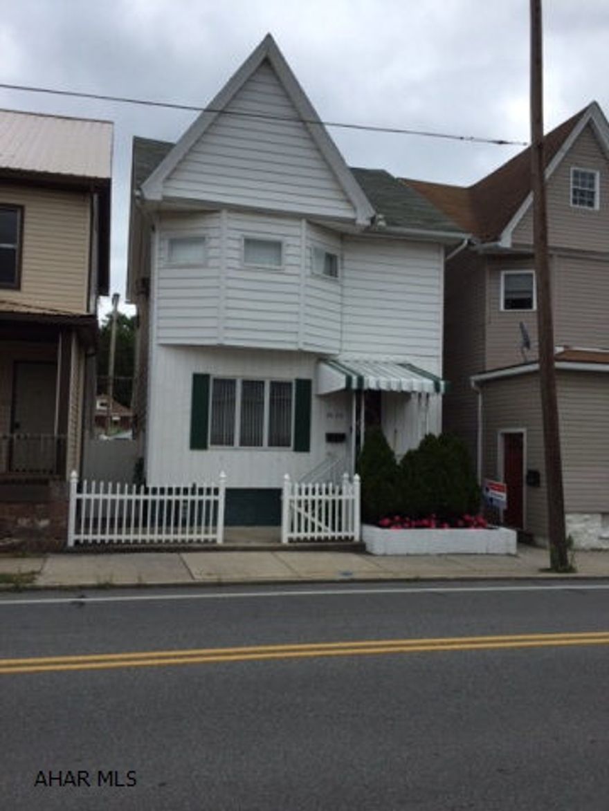 Well cared for 3 bedroom, 1.5 bath with 2 car garage. First floor half bath, walk-up attic, rear porch, shed.