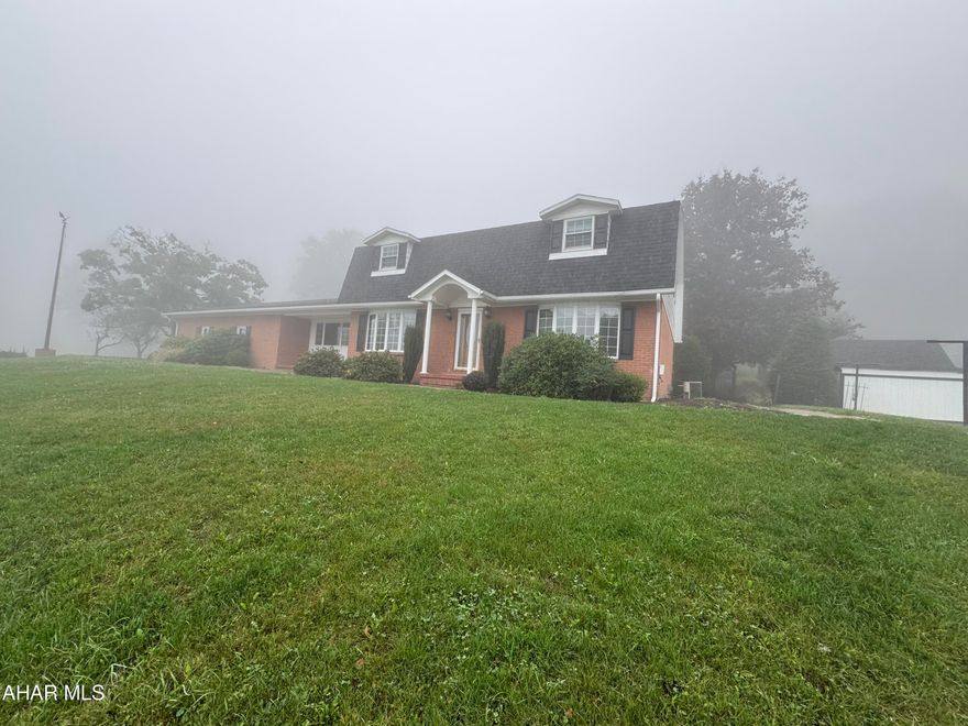 Two Story brick and frame featuring 3 bedrooms, 2.5 baths, Living room, Formal dining room, eat in kitchen, den, family room with fireplace, partially finished basement and laundry room. Paved drive connects to the attached 2 car garage and the detached 3 car garage. Nice landscaping and a large lot. Great house priced to sell quickly.