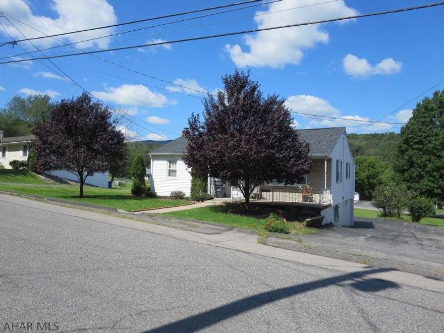 Solid 2 bedroom home located within walking distance of Historic Downtown Bedford. One year old roof, new washer and dryer, newer kitchen appliances. Hardwood floors under the carpet in most rooms. City water and sewer, central air. Includes a double lot.