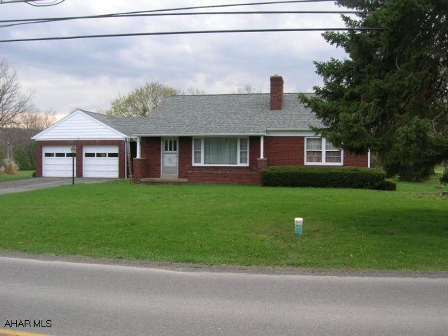 2BR brick ranch across from Foot of Ten Elem School. New roof, a few new windows. Nice back yard.