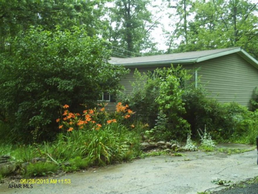 3 bedroom, 2 bath doublewide, nice wooded lot, needs TLC. Sold As Is use caution on back deck, needs repaired.