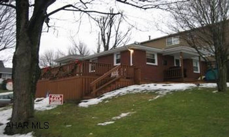 Raised brick ranch with attached garage. Only 5 blocks from courthouse. Large corner lot. Raised brick ranch with attached garage. Only 5 blocks from courthouse. Large corner lot.