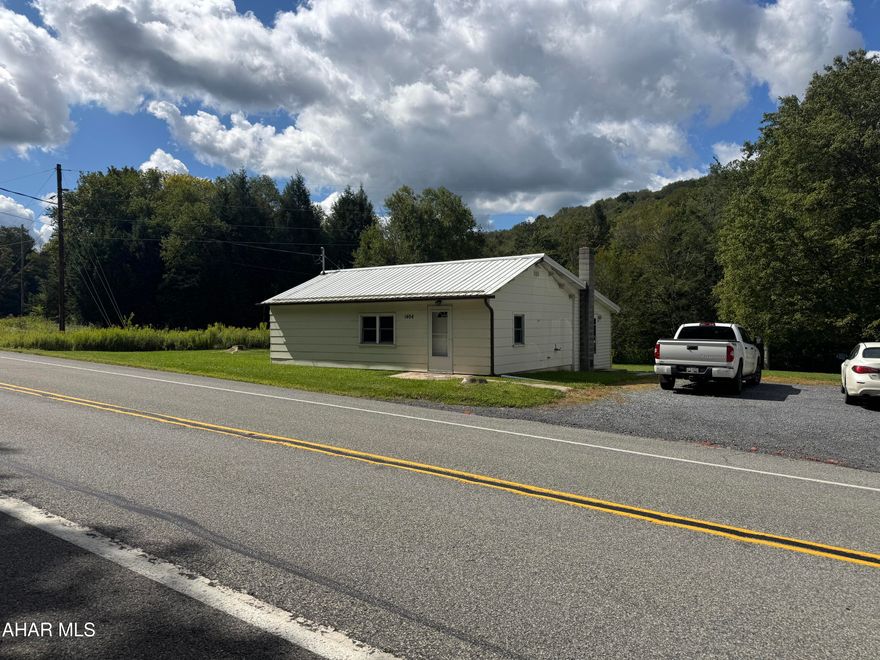 3-BR, 1-BA, ranch  in country location but still close to town!  Lovely one acre lot, mostly level ground with utility shed.  Great starter home or for someone looking to size down. No porch or deck.