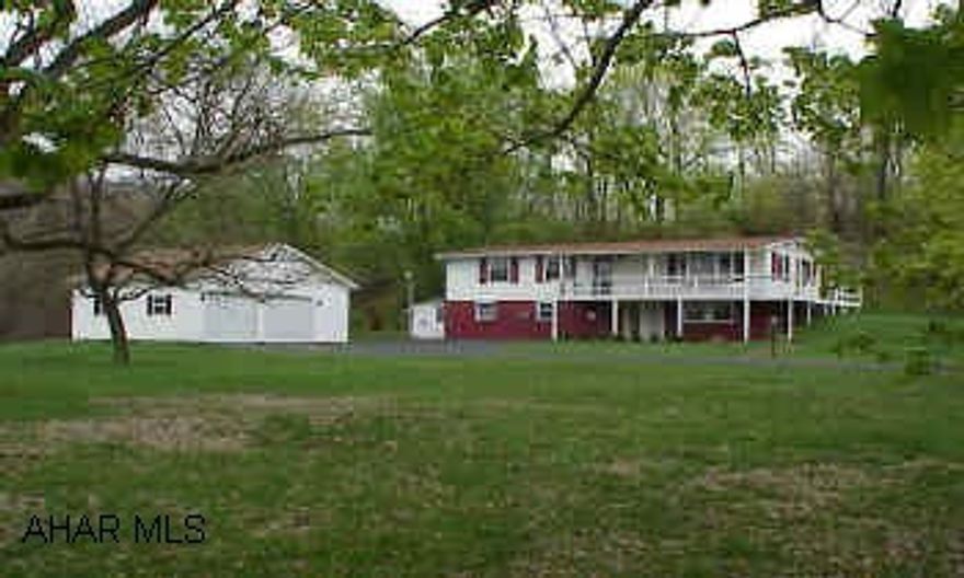 Village of Henrietta.  Modular on full finished foundation.  Very pretty setting with large pond.  Newer windows, roof, & furnace.  Recent survey copies available.