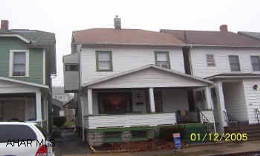 2 story frame house with refinished hardwood floors.