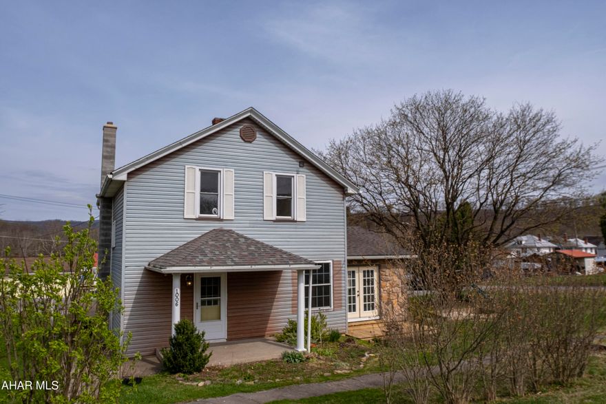 Discover the charm and versatility of this two-story, three-bedroom,  home nestled on a spacious corner lot with an additional parcel included. The main floor offers a convenient layout featuring a laundry area and a three-fourths bath, eat in kitchen with a pantry,a large family room and a living room with a walkout deck,  making daily routines a breeze. A mix of hardwood and laminate flooring throughout adds character and durability to the living spaces.

Upstairs, you'll find all three bedrooms and a full bath, providing comfort and privacy. Step out the back door onto a large deck—perfect for entertaining or simply unwinding—overlooking a generous yard with plenty of space for gardening, play, or gatherings.

As a bonus, the property includes an extra parcel that boasts a large garage, offering ample room for vehicles, storage, or workshop potential. This unique setup is perfect for anyone looking for added space and functionality.
Schedule a tour.