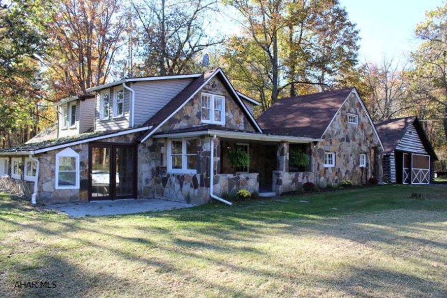 Log house living with 2 wood fireplaces adjacent to over 60 thousand acres of hunting ground. Enjoy this remodeled 1 acre home with 4 bedrooms and 2 full baths. New heating system, landscaping and updates throughout. Care and attention to detail on the work allows you to move right in and enjoy the cozy atmosphere with modern conveniences only 20 minutes to State College and 30 minutes to Altoona.